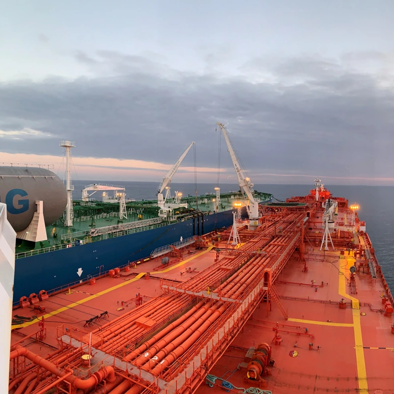 LNG STS transfer with sunset